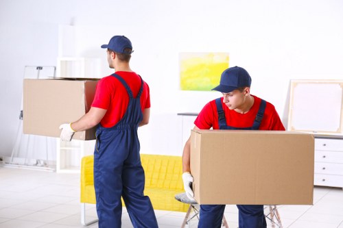 Flat removal team preparing to move items in a Finsbury Park apartment block