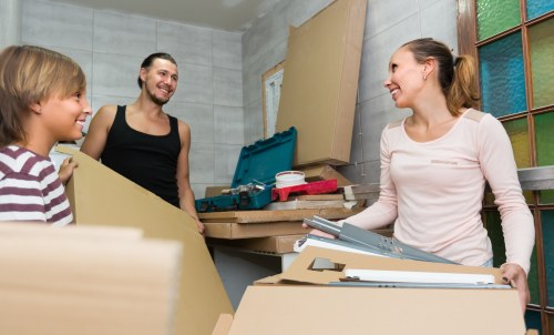 Finsbury Park moving crew managing heavy furniture in a London property