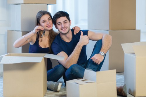 Moving team preparing boxes and furniture in Finsbury Park