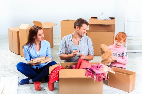 Local moving team working in a busy Finsbury Park street