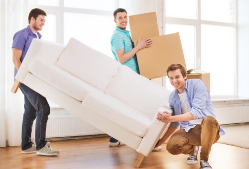 Careful loading of furniture for a local move in North London