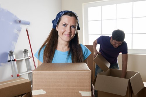 Removal team planning a house move in Finsbury Park on a residential street