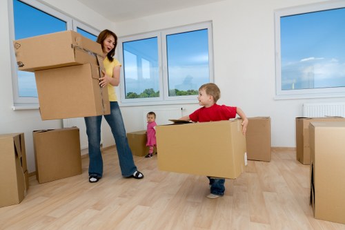 Packed moving boxes and furniture inside a removal van for North London relocation