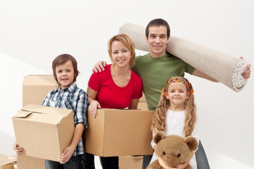 Boxes and wrapped furniture prepared for a home relocation in North London