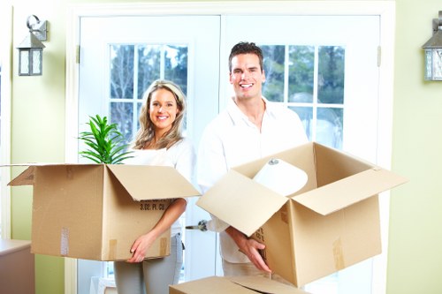 Removal team confirming booking details and service requirements